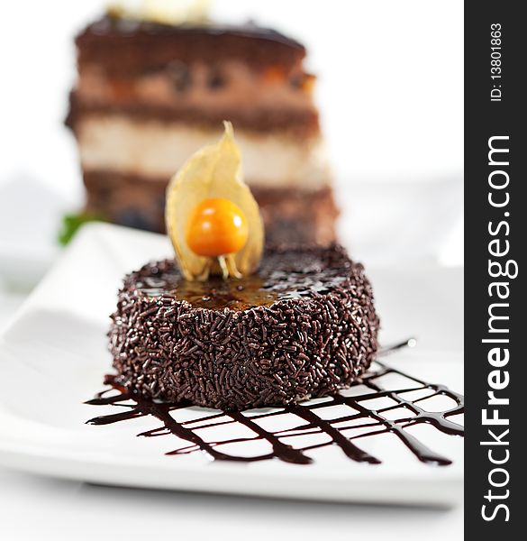 Dessert - Chocolate Iced Cake with Poppy Seed. Selective focus