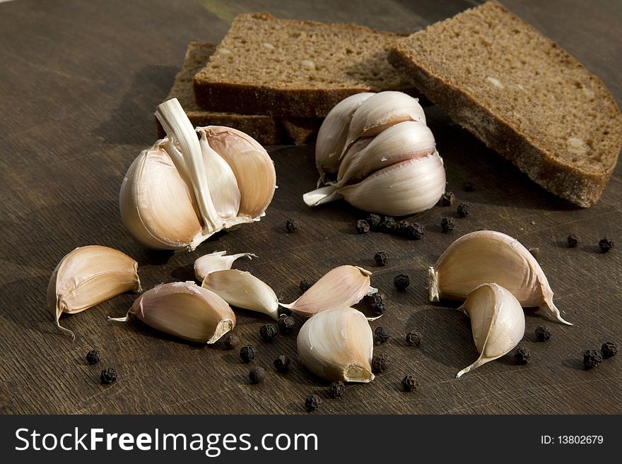 Garlic and black pepper with brown bread. Garlic and black pepper with brown bread