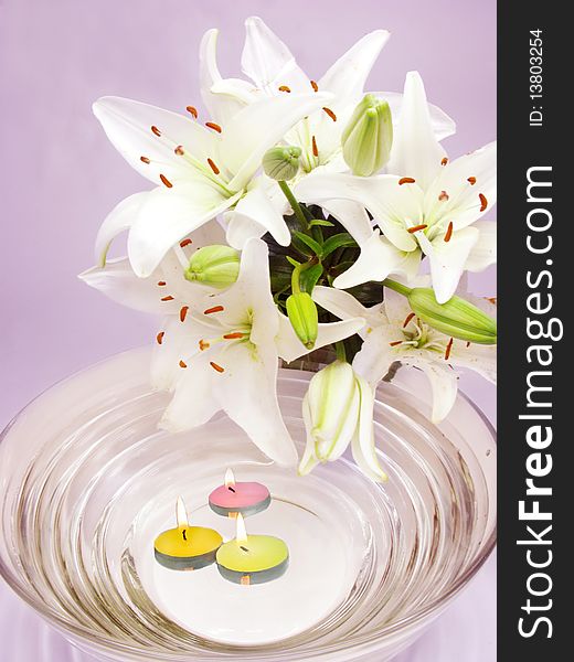 Spa lit candles lilies flowers health-care treatment. Spa lit candles lilies flowers health-care treatment