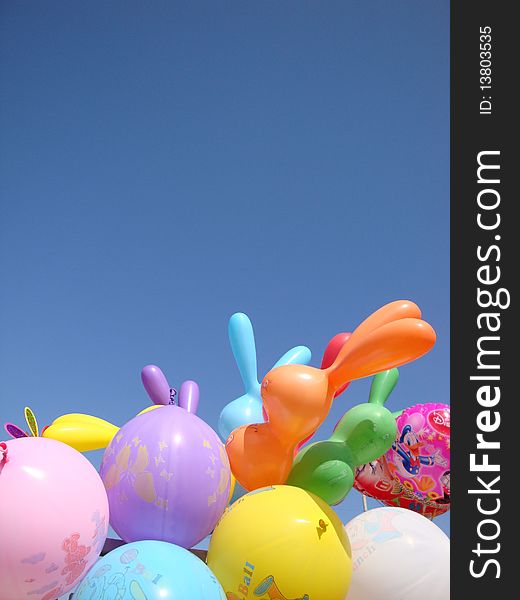 Colored dreams... child dreams and colored balloons in the park