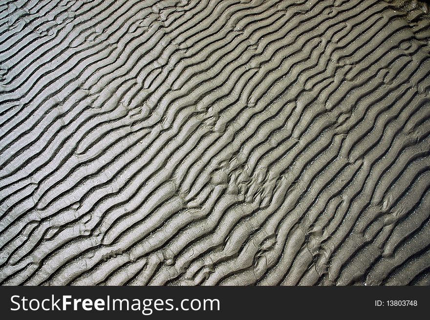 Close up of Wet Sand Waves, Sand Strips. Close up of Wet Sand Waves, Sand Strips.