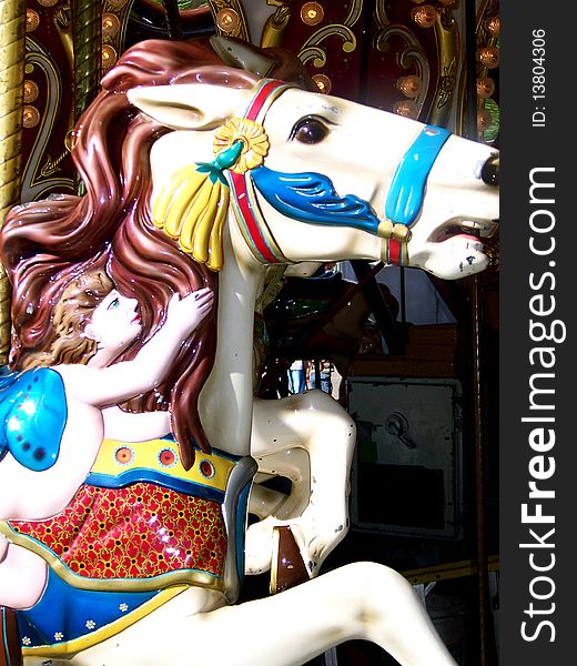Beautiful carousel horse ablaze with color. Beautiful carousel horse ablaze with color