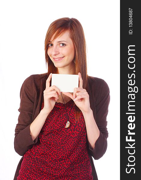 Smiling girl holding an empty business card, isolated on white. Smiling girl holding an empty business card, isolated on white