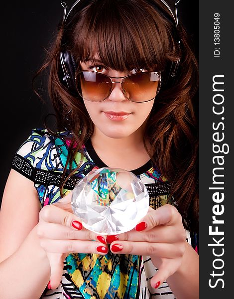 Picture of young woman with headphones and gem. Picture of young woman with headphones and gem