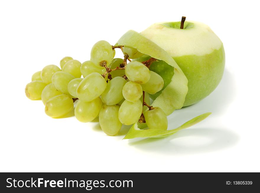 Green Apple and grapes on a white background