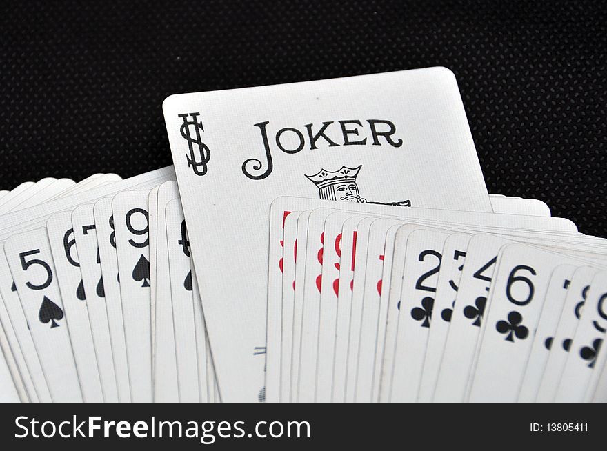 White playing cards and joker