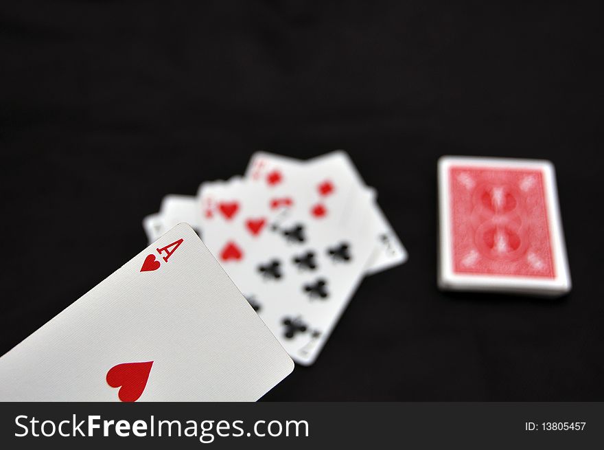 White playing cards and ace of heart