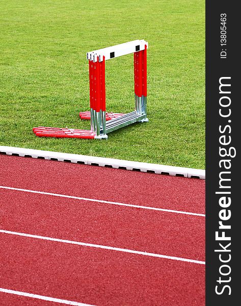 Track and hurdles on the green lawn