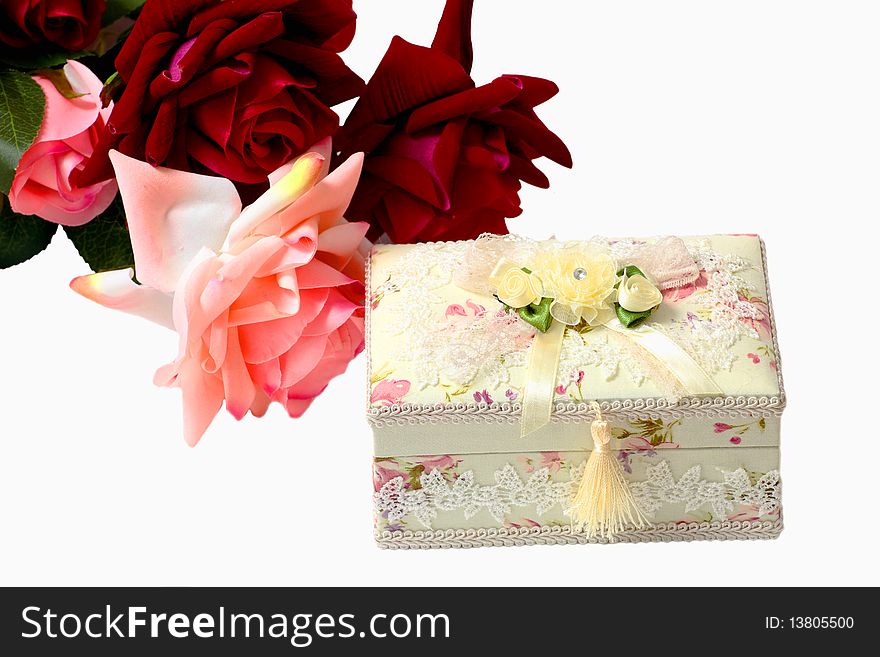 Gift for a holiday, beautiful flowers and a female casket. Gift for a holiday, beautiful flowers and a female casket