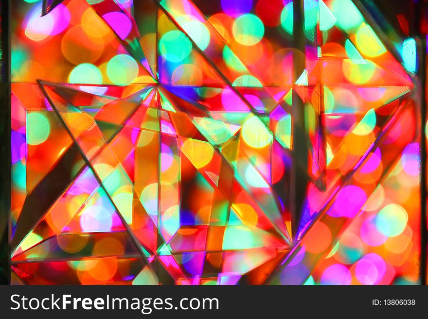 Colorful light blured behind artisitic glass. Colorful light blured behind artisitic glass.