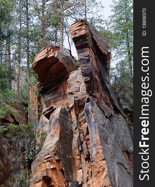 Red rock mountain looking like transformer character in Oak Creek Canyon near Sedona, Arizona. Red rock mountain looking like transformer character in Oak Creek Canyon near Sedona, Arizona.