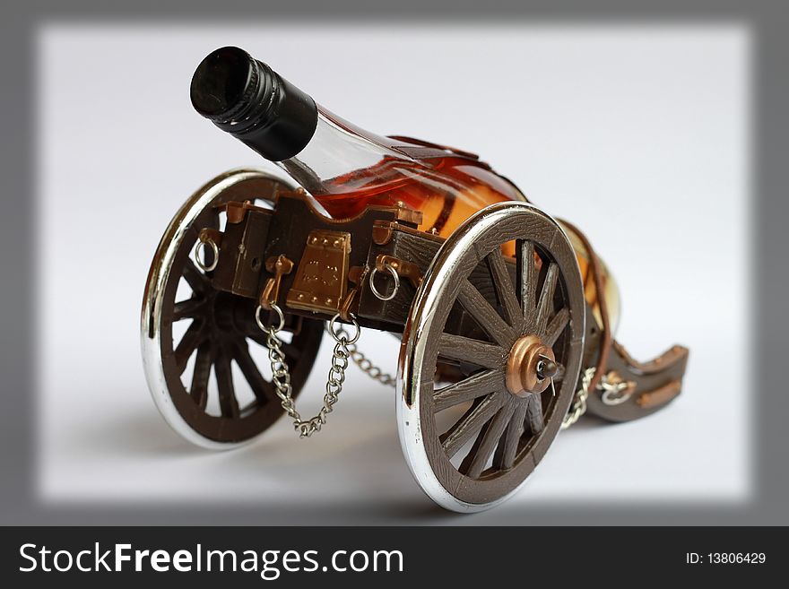 A bottle of wine isolated, like a cannon ready to fire