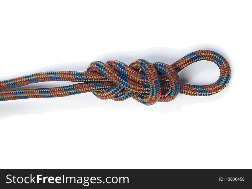 Coloured rope bundled up on white background