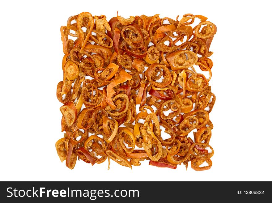 Dried red chili pepper rings, isolated on white background