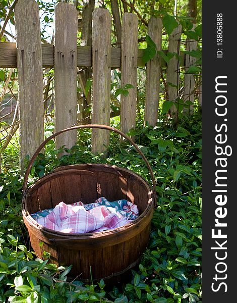 Time for the harvest - an empty basket waits to be filled. Time for the harvest - an empty basket waits to be filled.