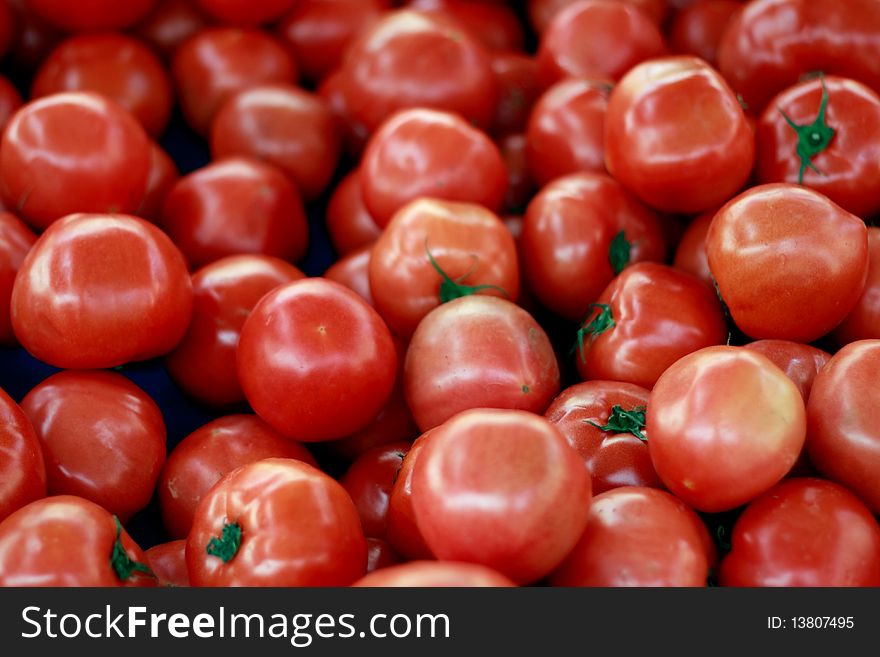 Red tomatoes on the market for sale. Red tomatoes on the market for sale