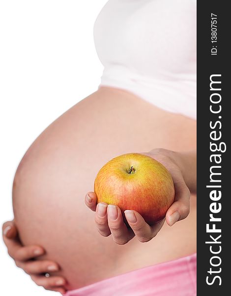 Pregnant girl with an healthy apple in the hand. Pregnant girl with an healthy apple in the hand