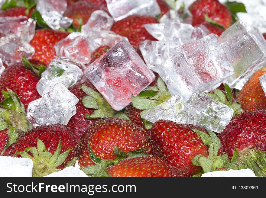 Background with red sweet strawberry and ice. Background with red sweet strawberry and ice