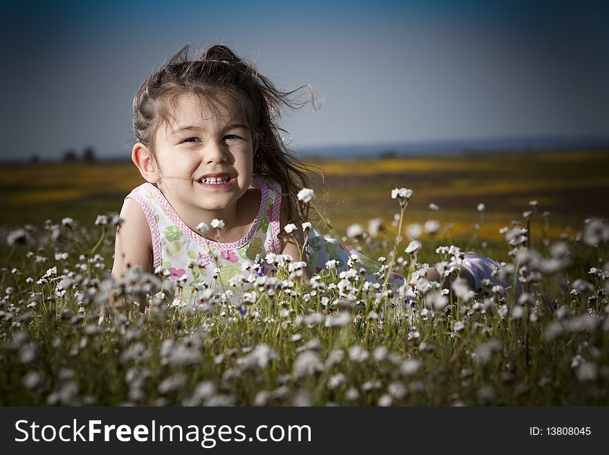 Little girl in the white flowers. Little girl in the white flowers