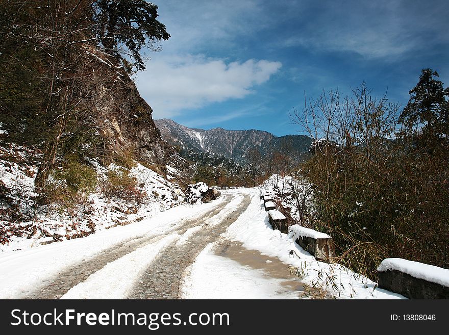 Snow road on mountain in Yunnan, China.