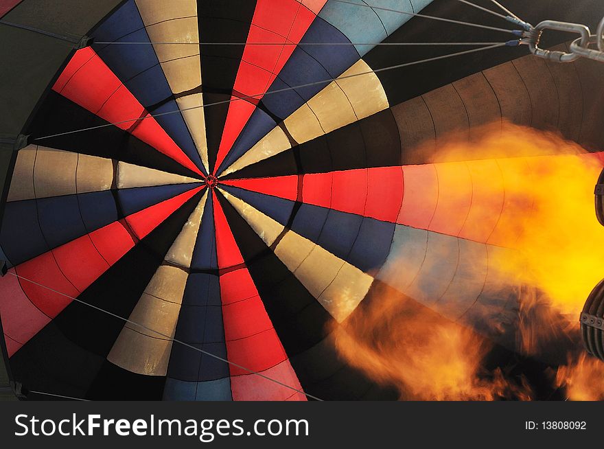 Looking up to see an inside colorful balloon. Looking up to see an inside colorful balloon