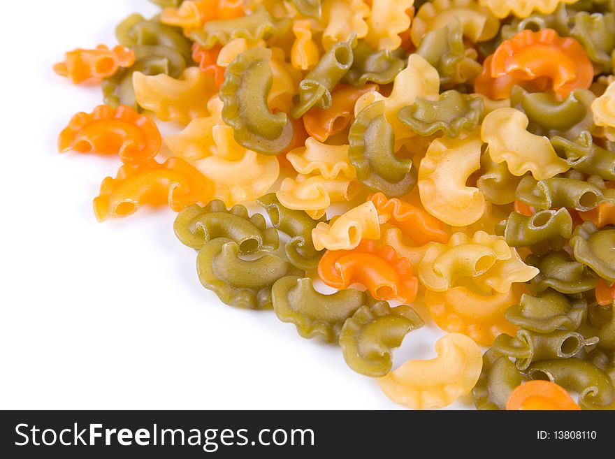 Multi-colored pasta isolated on a white background