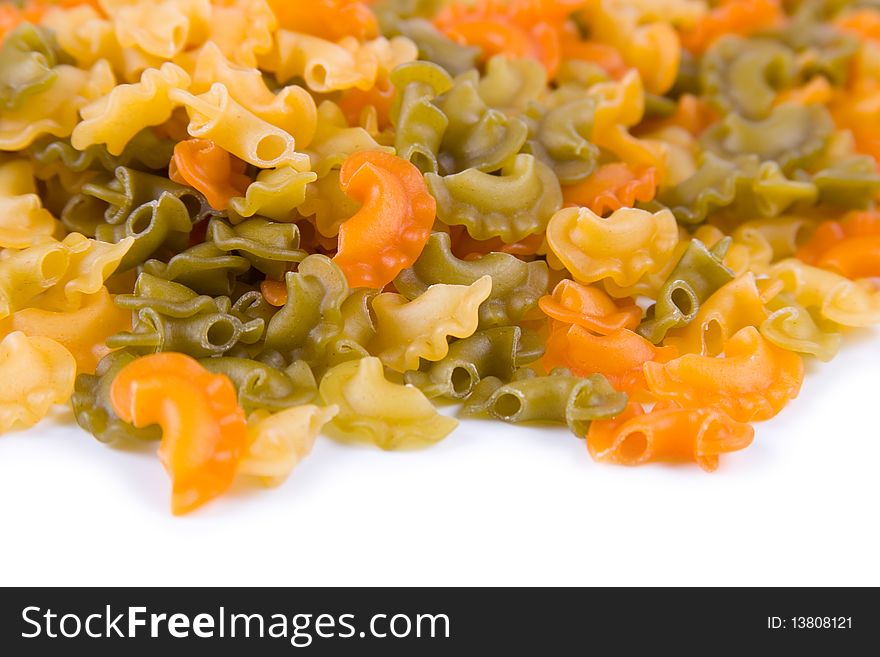 Multi-colored pasta isolated on a white background