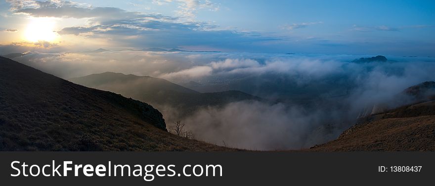 Panorama of mountains in the mist