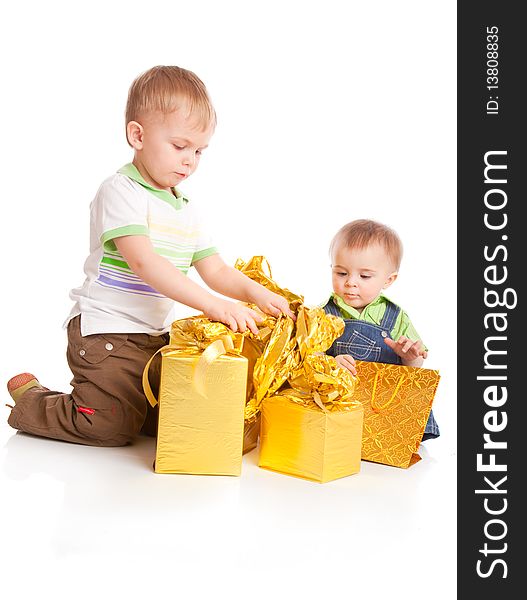 Two boys with gifts. Isolated on white background