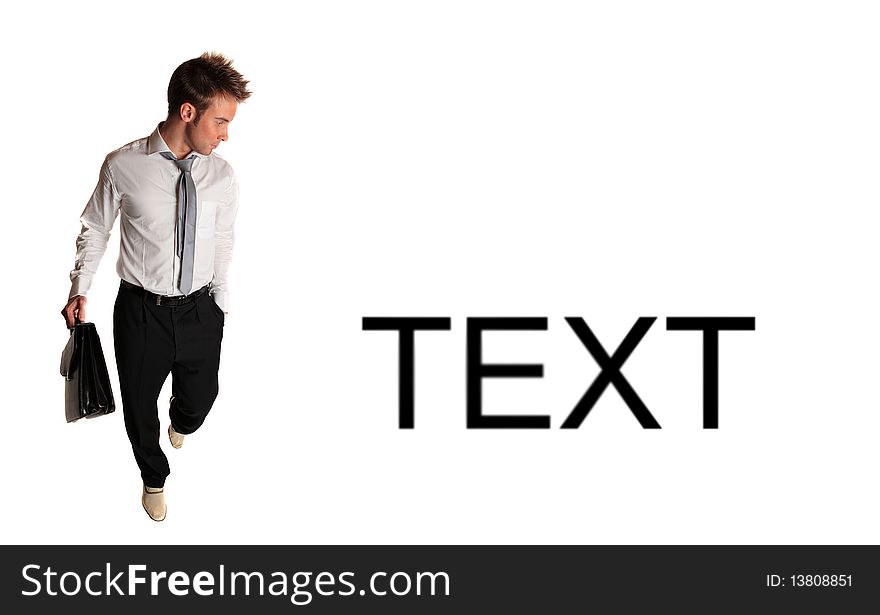 Young attractive businessman with text space