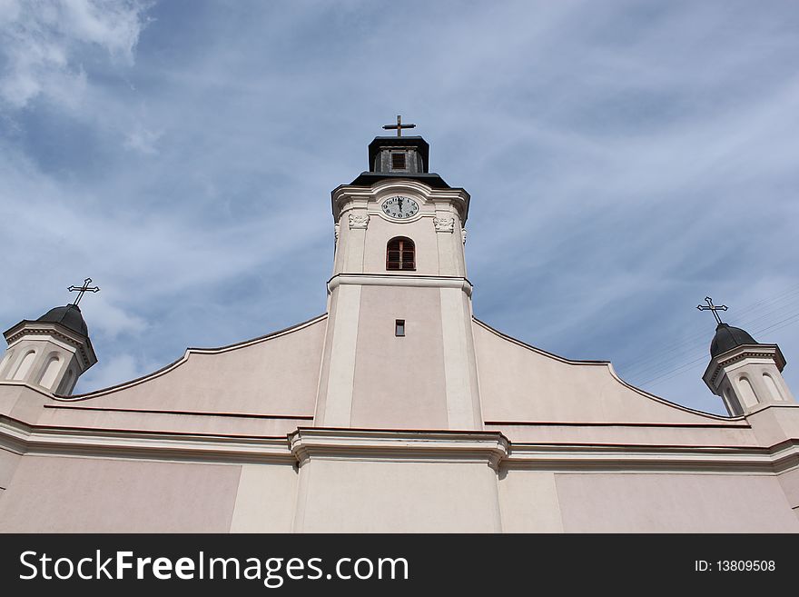 Ancient church architecture, the current church, a monumental building, with a chapel, the blue sky, old clock on the tower, religion, art, historic building, sacred place of worship, religious life