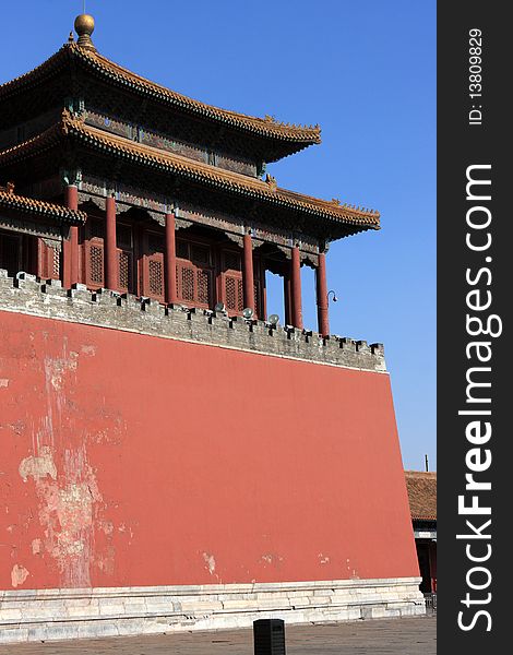 Ancient temple on wall in forbidden city was the Chinese imperial palace. It is located in Beijing, China.