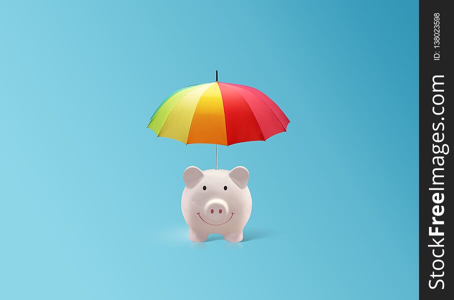 Pink piggy ceramic bank with colorful rainbow umbrella, insurance