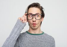 Free Attractive Man Wearing Yellow Sweater Astonished And Amazed In Shock And Surprise Face Expression Royalty Free Stock Photos - 138060938