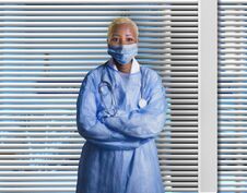 Free Attractive And Confident Black African American Medicine Doctor Wearing Face Mask And Blue Scrubs Standing Corporate At Stock Image - 138084881