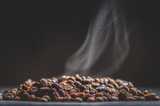 Coffee Beans And Smoke Stock Images