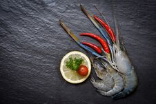 Seafood Shrimps Shellfish / Fresh Prawns Ocean Gourmet Raw Shrimp With Chilli Tomato Lemon And Green Parsley Royalty Free Stock Photography