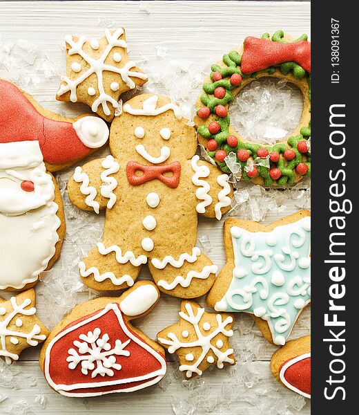 Christmas decorated gingerbread cookies background. Shallow dof. Christmas decorated gingerbread cookies background. Shallow dof