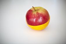 Orange And Apple Fruit Halves Royalty Free Stock Photography
