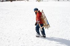 Young Boy Carries The Sledge Royalty Free Stock Photo Young Boy Carries The Sledge Royalty Free Stock Photo