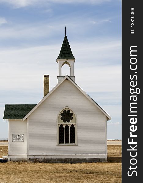 Old United church located in the countyside between two major highways on the Prairies. Old United church located in the countyside between two major highways on the Prairies
