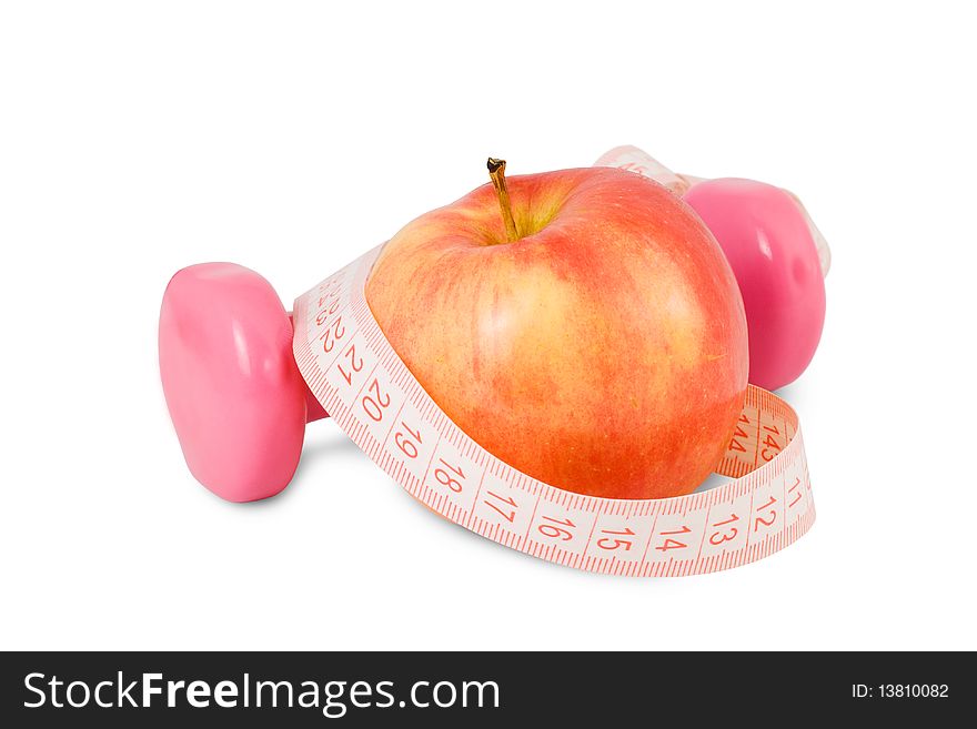 One dumbbell and red apple on a white background. One dumbbell and red apple on a white background