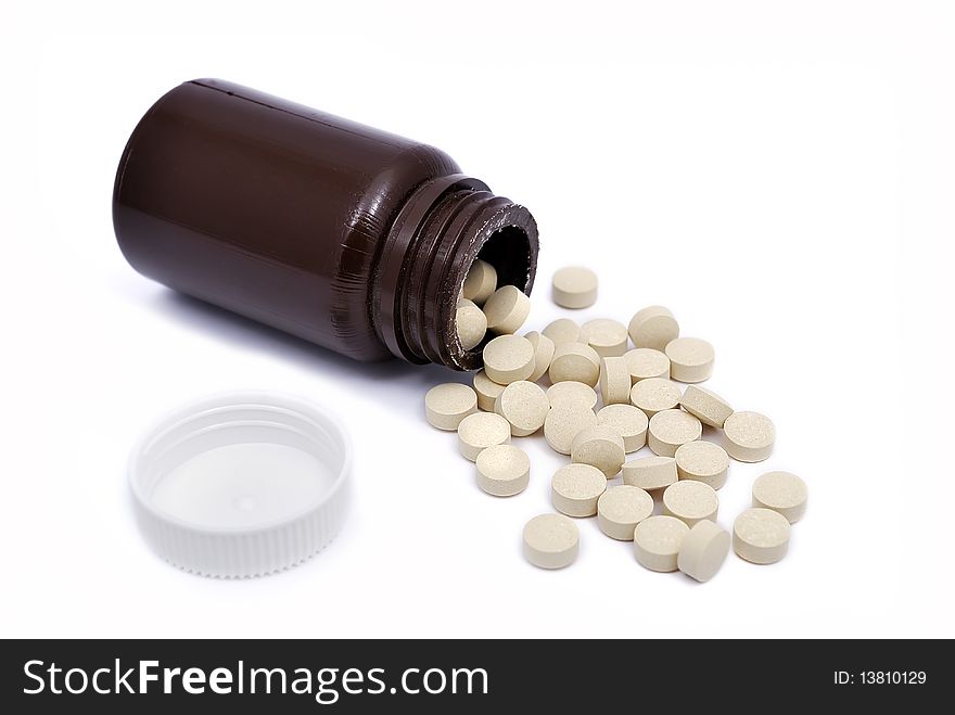 Open a jar of pills on white background. Open a jar of pills on white background