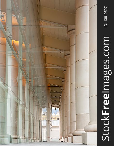 This is one of the sides of Teatre Nacional de Catalunya's building. The space between the columns and the glass structure forms long corridors at each side of the building. This is one of the sides of Teatre Nacional de Catalunya's building. The space between the columns and the glass structure forms long corridors at each side of the building.