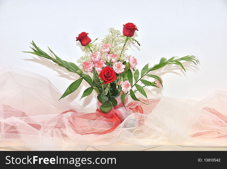 A bouquet of flowers in glass. A bouquet of flowers in glass