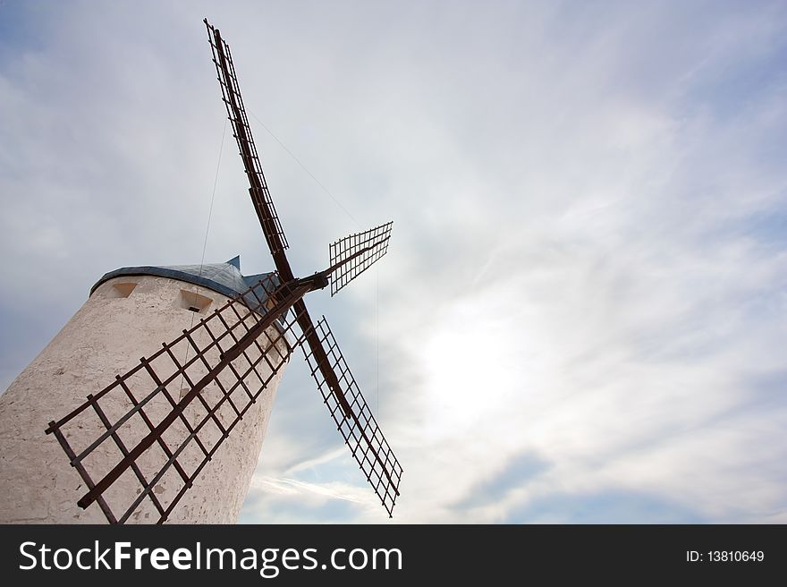 Windmill Against Cloudy Sky