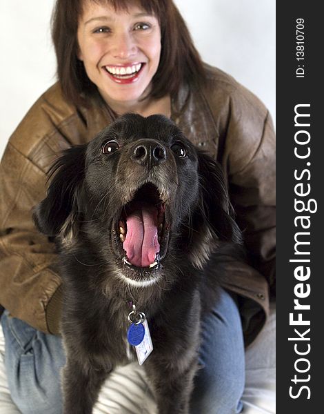 Brown Haired woman with Cocker Spaniel Mix Dog