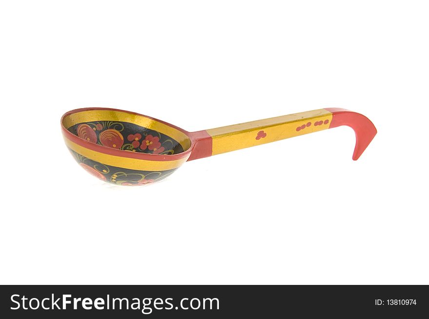 One wooden spoon decorated isolated close up