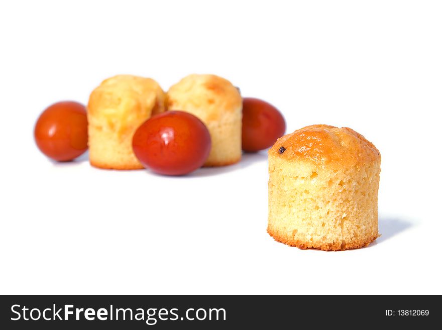 Russian Easter food colored eggs and cakes isolated on white