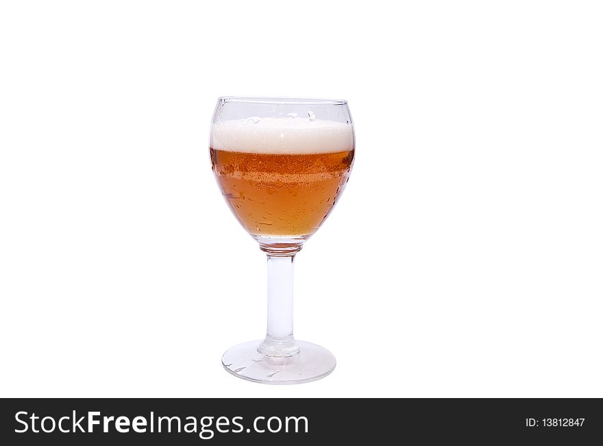 Fressh beer in glass isolated on white background. Fressh beer in glass isolated on white background